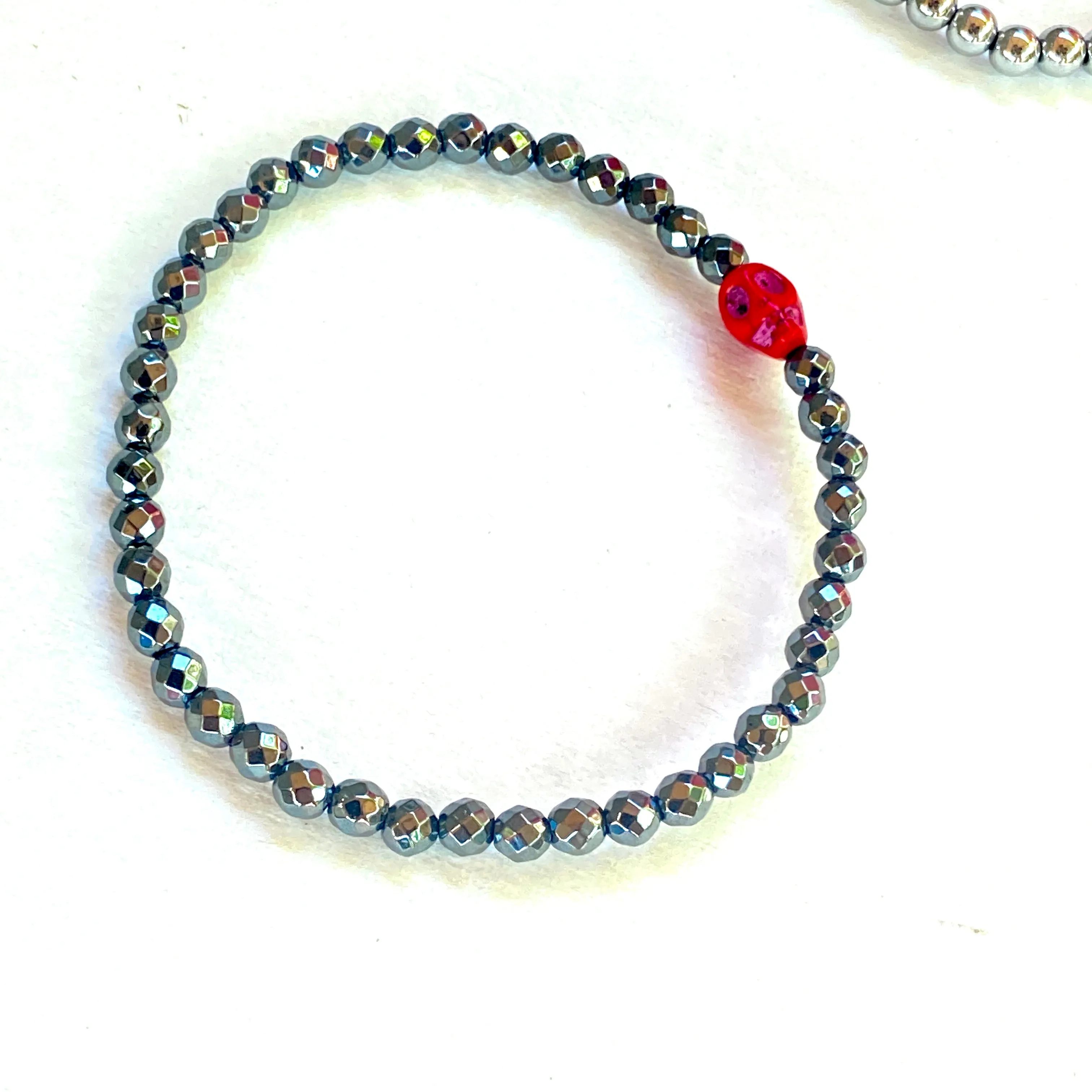 Hematite gemstone and Skull Bracelet